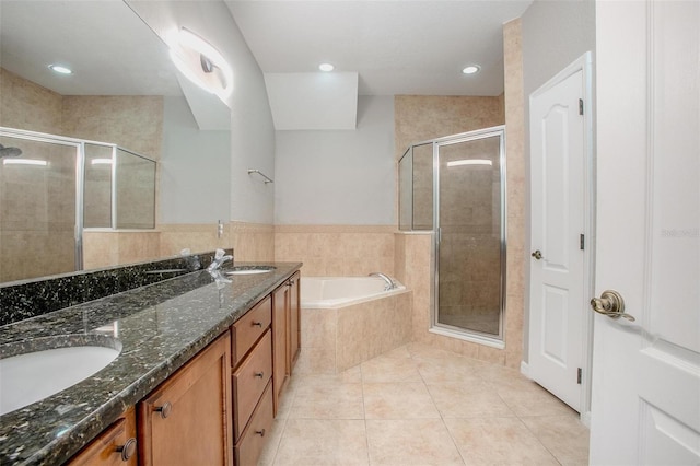 201 Dyson Dr, Deland, FL 32724 - full bath with a stall shower, a bath, tile patterned floors, and double vanity