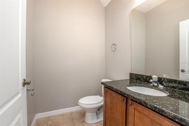 201 Dyson Dr, Deland, FL 32724 - half bath with vanity, tile patterned floors, toilet, and baseboards