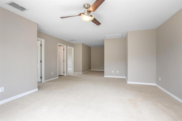 201 Dyson Dr, Deland, FL 32724 - unfurnished room featuring light carpet, ceiling fan, baseboards, and attic access
