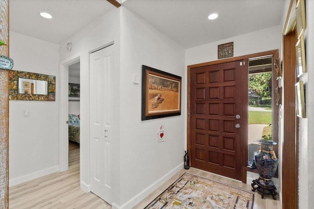 96 Hollow Branch Xing, Ormond Beach, FL 32174 - entryway featuring light wood-style flooring, baseboards, and recessed lighting