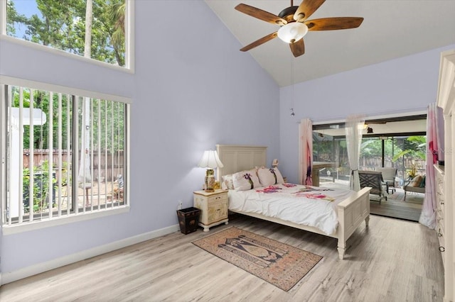 96 Hollow Branch Xing, Ormond Beach, FL 32174 - bedroom with high vaulted ceiling, wood finished floors, baseboards, a ceiling fan, and access to outside