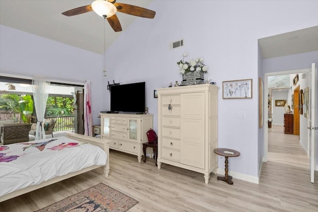 96 Hollow Branch Xing, Ormond Beach, FL 32174 - bedroom featuring light wood-style floors, access to outside, baseboards, a ceiling fan, and high vaulted ceiling