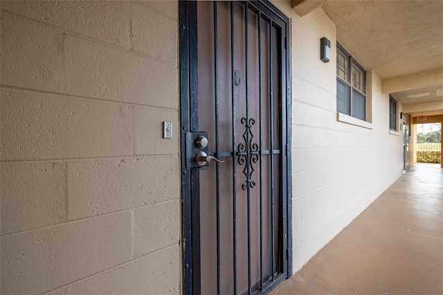325 Wilder Blvd Unit A102, Daytona Beach, FL 32114 - property entrance with concrete block siding