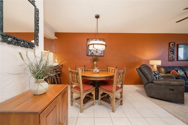 325 Wilder Blvd Unit A102, Daytona Beach, FL 32114 - dining area with a ceiling fan and light tile patterned floors