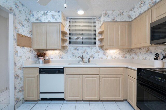 325 Wilder Blvd Unit A102, Daytona Beach, FL 32114 - kitchen featuring dishwasher, wallpapered walls, light brown cabinets, a sink, and electric range oven