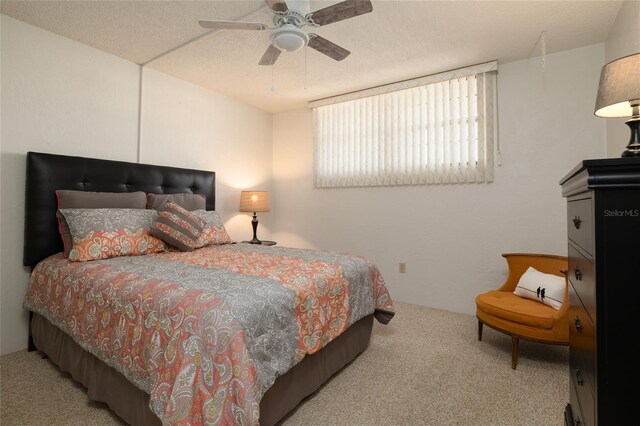 325 Wilder Blvd Unit A102, Daytona Beach, FL 32114 - bedroom featuring carpet flooring and a ceiling fan
