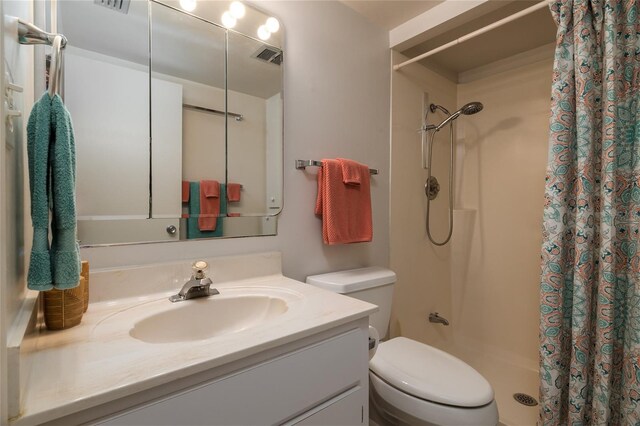 325 Wilder Blvd Unit A102, Daytona Beach, FL 32114 - full bathroom featuring toilet, a shower stall, and vanity