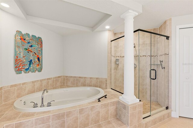 2901 S Atlantic Ave Unit 401, Daytona Beach Shores, FL 32118 - bathroom featuring a stall shower, recessed lighting, a bath, and decorative columns