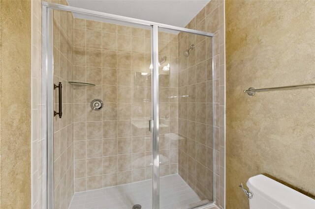 2901 S Atlantic Ave Unit 401, Daytona Beach Shores, FL 32118 - full bathroom with toilet and a shower stall