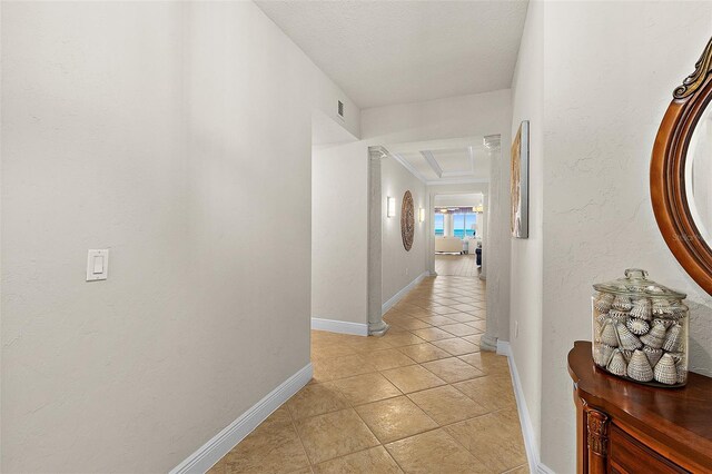 2901 S Atlantic Ave Unit 401, Daytona Beach Shores, FL 32118 - corridor with light tile patterned floors and baseboards