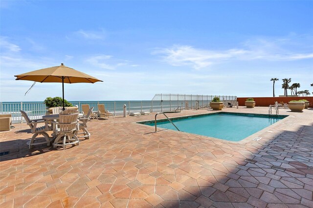 2901 S Atlantic Ave Unit 401, Daytona Beach Shores, FL 32118 - community pool with a patio area and a water view