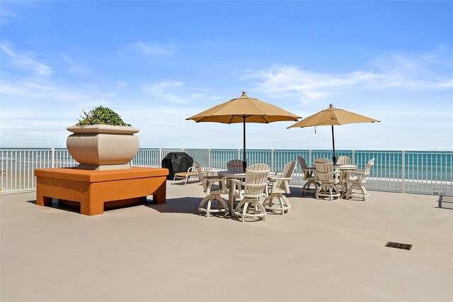 2901 S Atlantic Ave Unit 401, Daytona Beach Shores, FL 32118 - view of patio / terrace featuring a water view