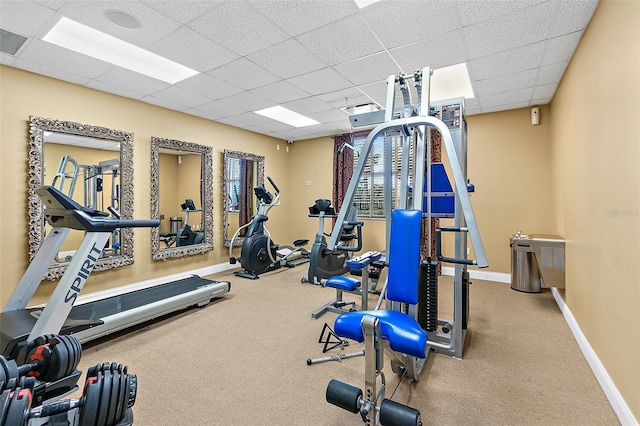 2901 S Atlantic Ave Unit 401, Daytona Beach Shores, FL 32118 - exercise room featuring a drop ceiling and baseboards