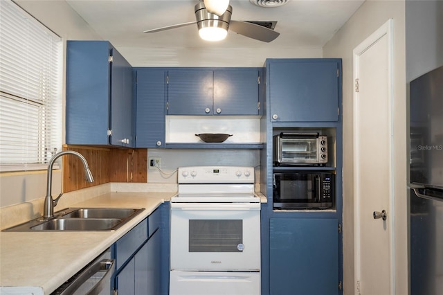 1284 Vanderbilt Dr, Ormond Beach, FL 32174 - kitchen featuring black appliances, a sink, blue cabinets, and light countertops