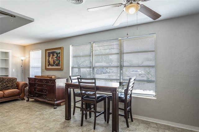 1284 Vanderbilt Dr, Ormond Beach, FL 32174 - dining room with ceiling fan and light flooring