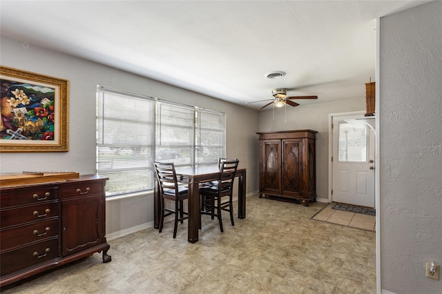 1284 Vanderbilt Dr, Ormond Beach, FL 32174 - dining space with ceiling fan, light floors, and baseboards