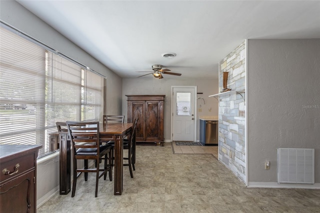 1284 Vanderbilt Dr, Ormond Beach, FL 32174 - dining space featuring ceiling fan and baseboards
