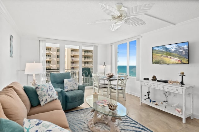 2987 S Atlantic Unit 606, Daytona Beach Shores, FL 32118 - living room featuring ceiling fan, crown molding, light tile patterned floors, and baseboards