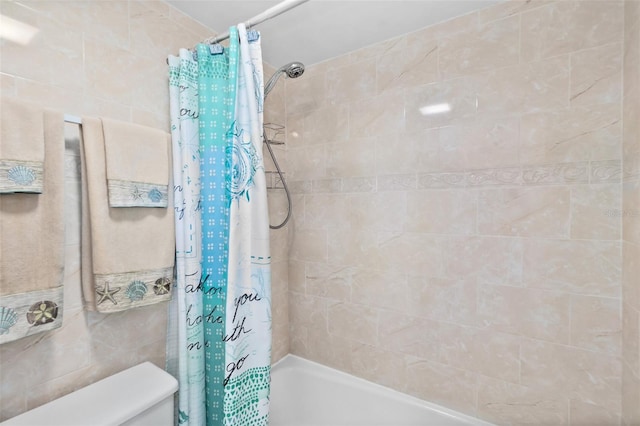 2987 S Atlantic Unit 606, Daytona Beach Shores, FL 32118 - full bathroom featuring shower / bathtub combination with curtain and toilet