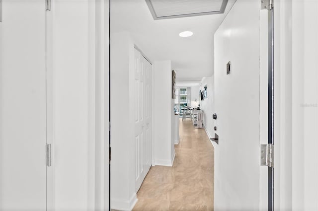 2987 S Atlantic Unit 606, Daytona Beach Shores, FL 32118 - hall with baseboards and recessed lighting