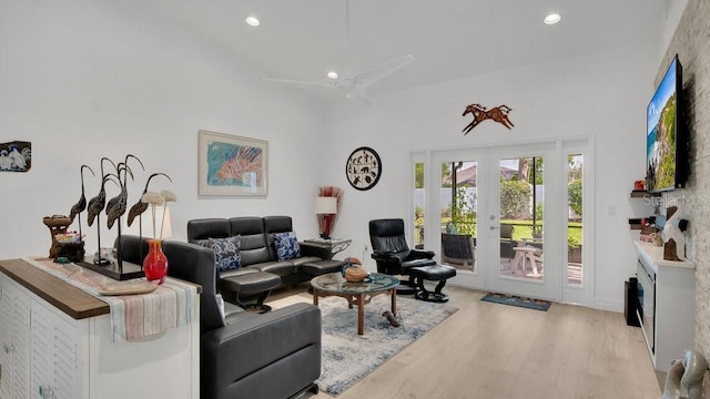 302 Tammie Sue Ln, Deland, FL 32724 - living room with french doors, wood finished floors, recessed lighting, a fireplace, and a high ceiling