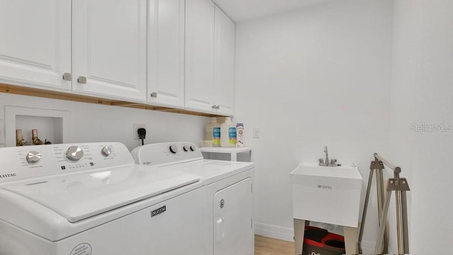 302 Tammie Sue Ln, Deland, FL 32724 - washroom featuring washing machine and dryer and cabinet space