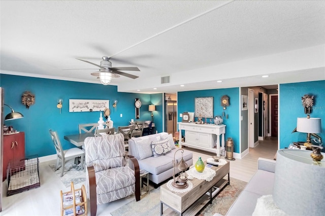 625 N Halifax Ave Unit 11, Daytona Beach, FL 32118 - living area with a ceiling fan, light wood finished floors, baseboards, and recessed lighting