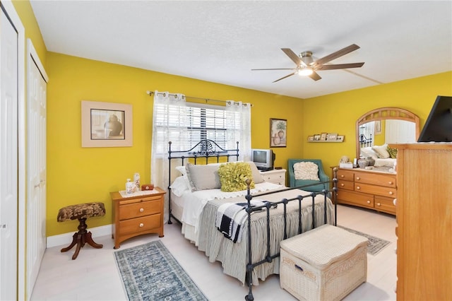 625 N Halifax Ave Unit 11, Daytona Beach, FL 32118 - bedroom featuring a ceiling fan, baseboards, and a closet
