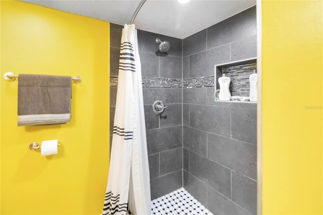625 N Halifax Ave Unit 11, Daytona Beach, FL 32118 - bathroom featuring a tile shower
