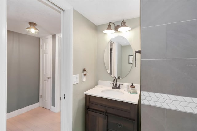 625 N Halifax Ave Unit 11, Daytona Beach, FL 32118 - bathroom featuring vanity and baseboards