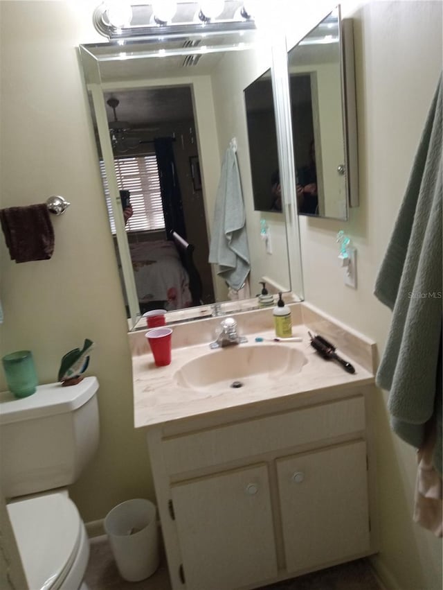 1640 Juno Trl Unit 103F, Astor, FL 32102 - bathroom featuring vanity and toilet