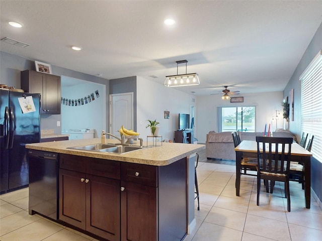 2919 Sime St, New Smyrna Beach, FL 32168 - kitchen with dishwasher, black refrigerator with ice dispenser, a sink, a ceiling fan, and light countertops