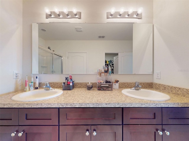 2919 Sime St, New Smyrna Beach, FL 32168 - full bathroom with double vanity and a stall shower