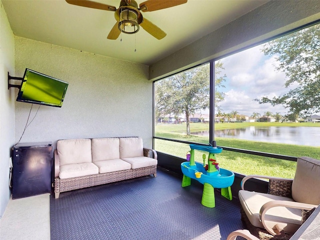2919 Sime St, New Smyrna Beach, FL 32168 - sunroom / solarium featuring a water view, a ceiling fan, and an outdoor hangout area