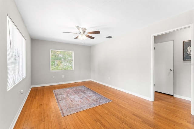 31 Lake Dr, Debary, FL 32713 - spare room with ceiling fan, light wood-style floors, and baseboards