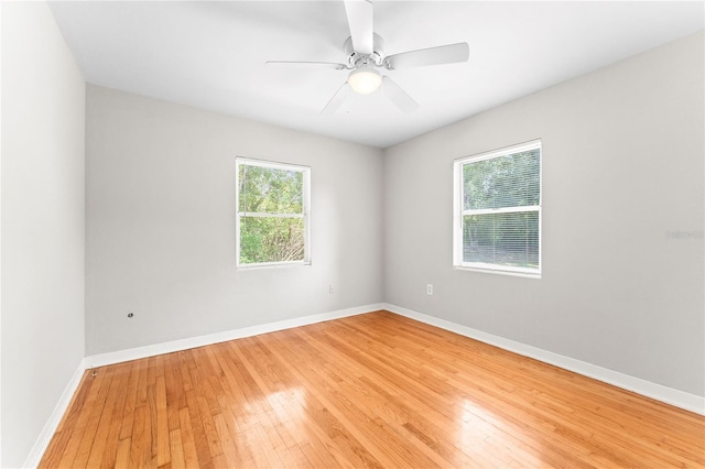 31 Lake Dr, Debary, FL 32713 - spare room featuring light wood-style flooring, baseboards, and a ceiling fan