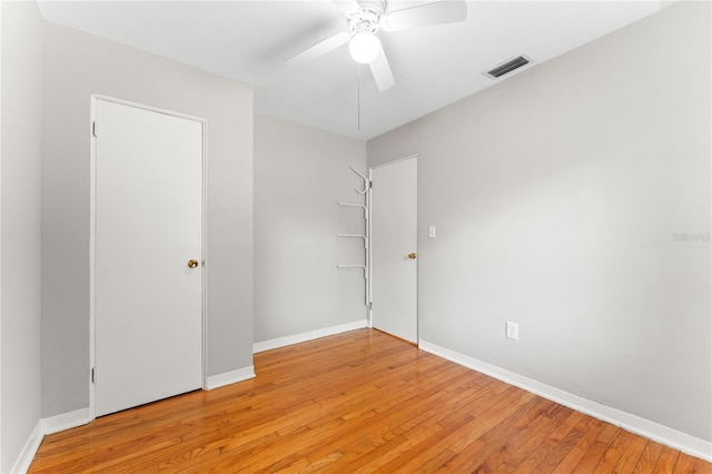 31 Lake Dr, Debary, FL 32713 - unfurnished bedroom with light wood-style floors, baseboards, and ceiling fan