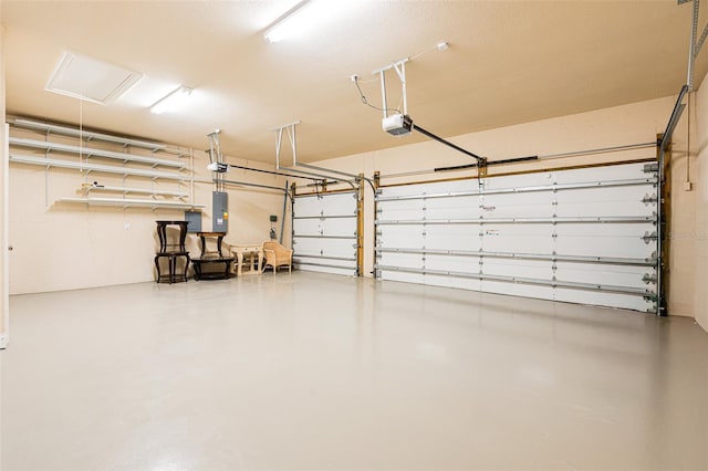 4427 S Atlantic Ave, Port Orange, FL 32127 - garage featuring a garage door opener and electric panel