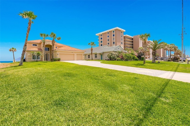 4427 S Atlantic Ave, Port Orange, FL 32127 - view of property featuring concrete driveway and an attached garage