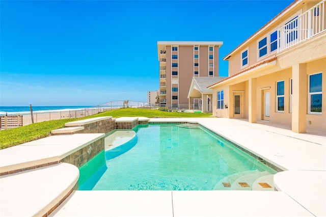 4427 S Atlantic Ave, Port Orange, FL 32127 - view of swimming pool with a fenced backyard, a water view, and a patio area