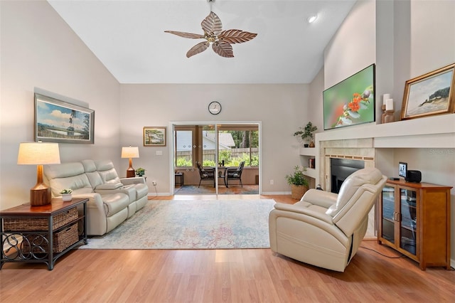 1637 Bent Oaks Blvd, Deland, FL 32724 - living room with a ceiling fan, high vaulted ceiling, wood finished floors, and baseboards