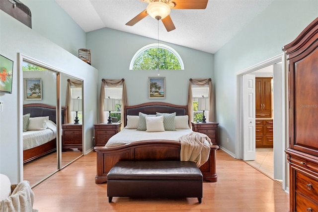 1637 Bent Oaks Blvd, Deland, FL 32724 - bedroom with light wood finished floors, a ceiling fan, a closet, high vaulted ceiling, and ensuite bathroom