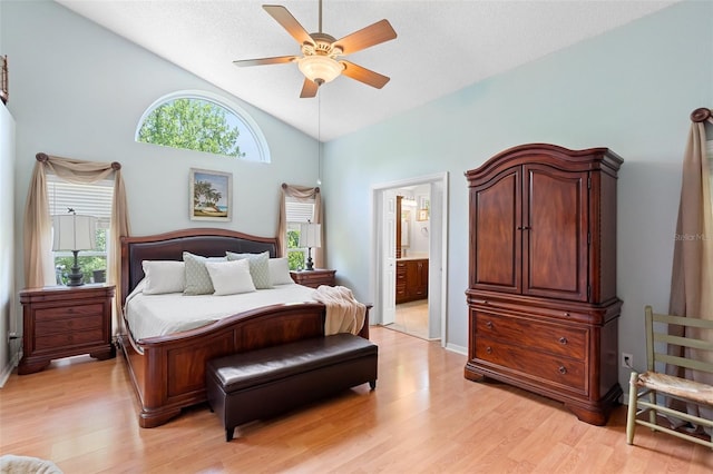 1637 Bent Oaks Blvd, Deland, FL 32724 - bedroom with light wood-style flooring, ensuite bath, a ceiling fan, and high vaulted ceiling