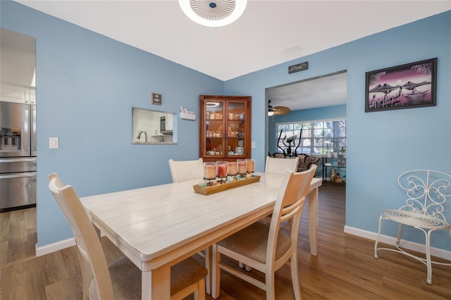 5 Greenfern Cir, Ormond Beach, FL 32174 - dining area featuring wood finished floors and baseboards