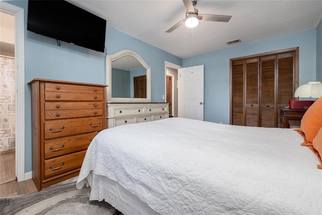 5 Greenfern Cir, Ormond Beach, FL 32174 - bedroom featuring a closet, wood finished floors, and ceiling fan