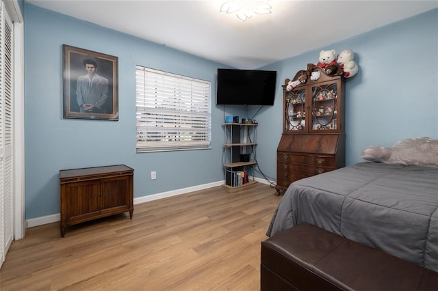 5 Greenfern Cir, Ormond Beach, FL 32174 - bedroom featuring a closet, light wood-style flooring, and baseboards