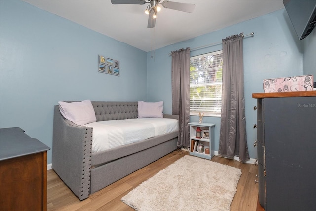 5 Greenfern Cir, Ormond Beach, FL 32174 - bedroom with wood finished floors, a ceiling fan, and baseboards