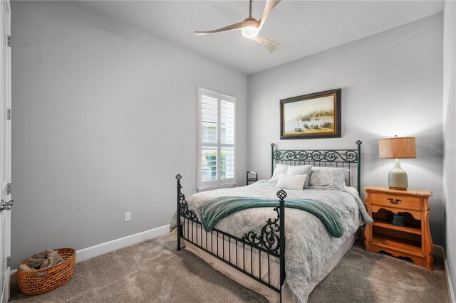 344 Stirling Bridge Dr, Ormond Beach, FL 32174 - carpeted bedroom featuring baseboards and a ceiling fan