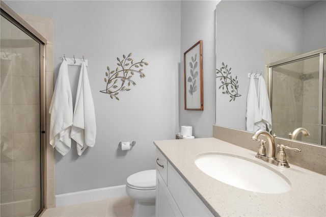 344 Stirling Bridge Dr, Ormond Beach, FL 32174 - full bathroom with a stall shower, toilet, vanity, baseboards, and tile patterned flooring