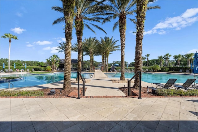 344 Stirling Bridge Dr, Ormond Beach, FL 32174 - community pool featuring a patio area